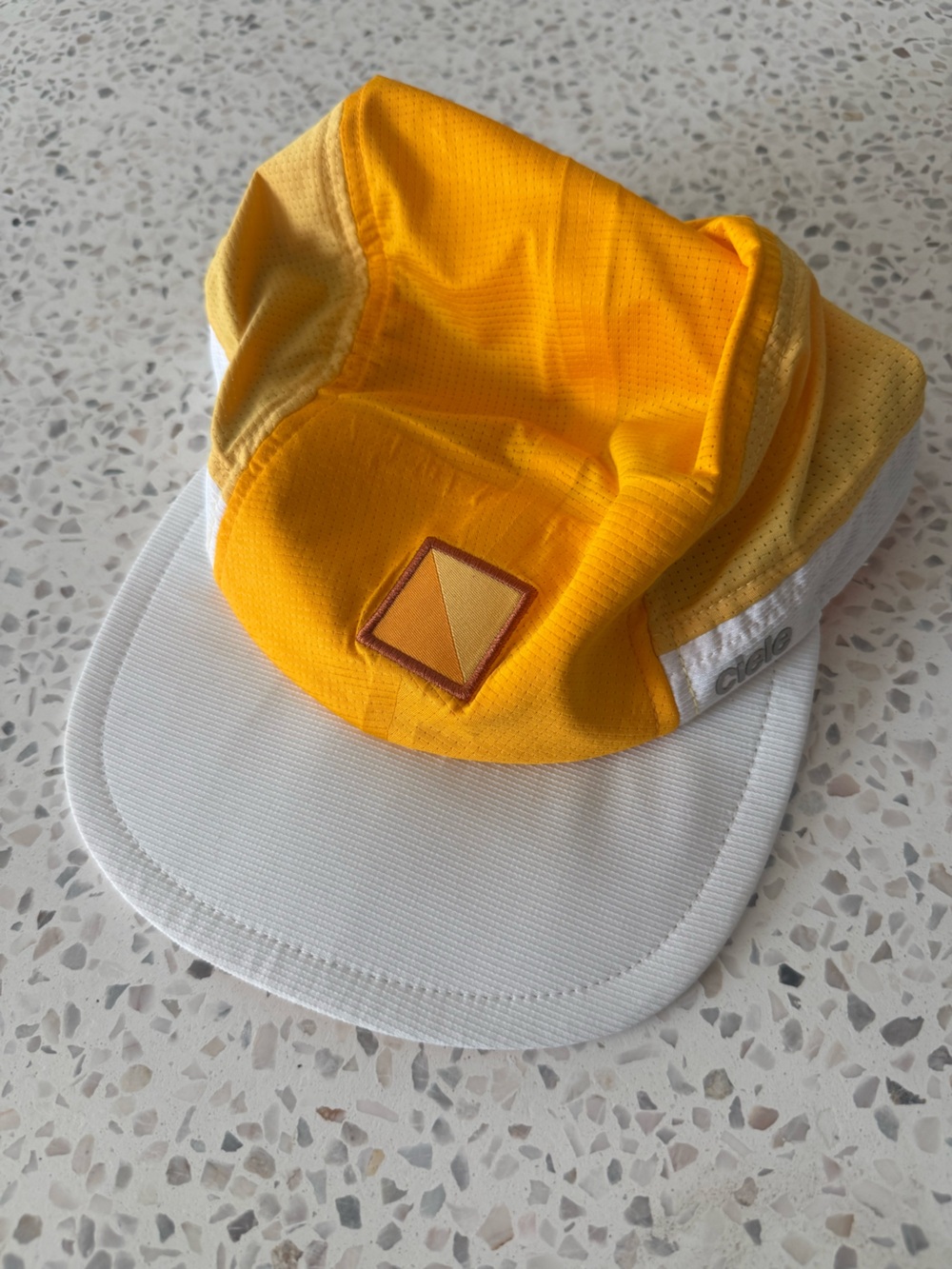 Ciele/ Tracksmith collab running hat